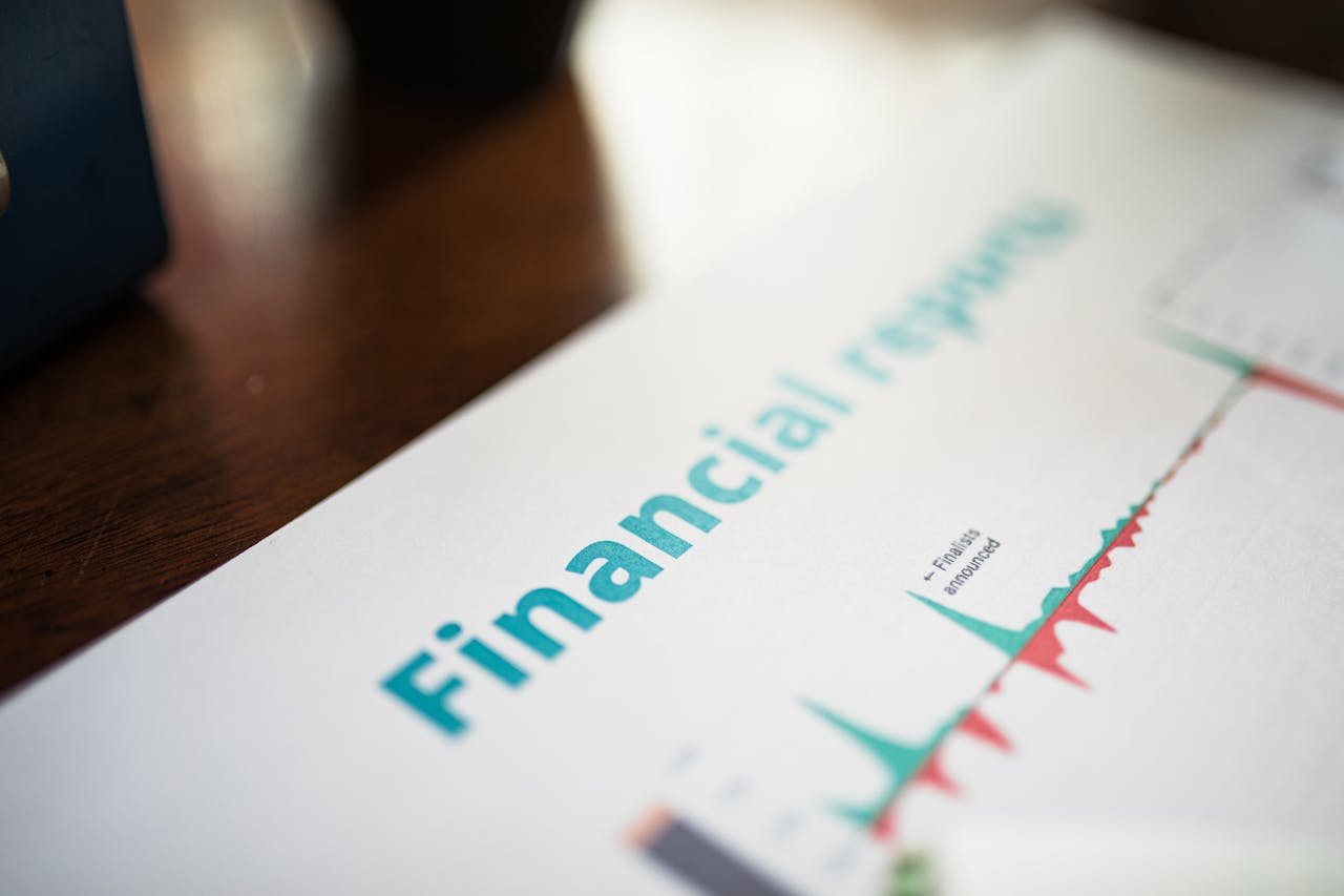 services-02 Detailed view of a financial report with a focus on graphs and data analysis.